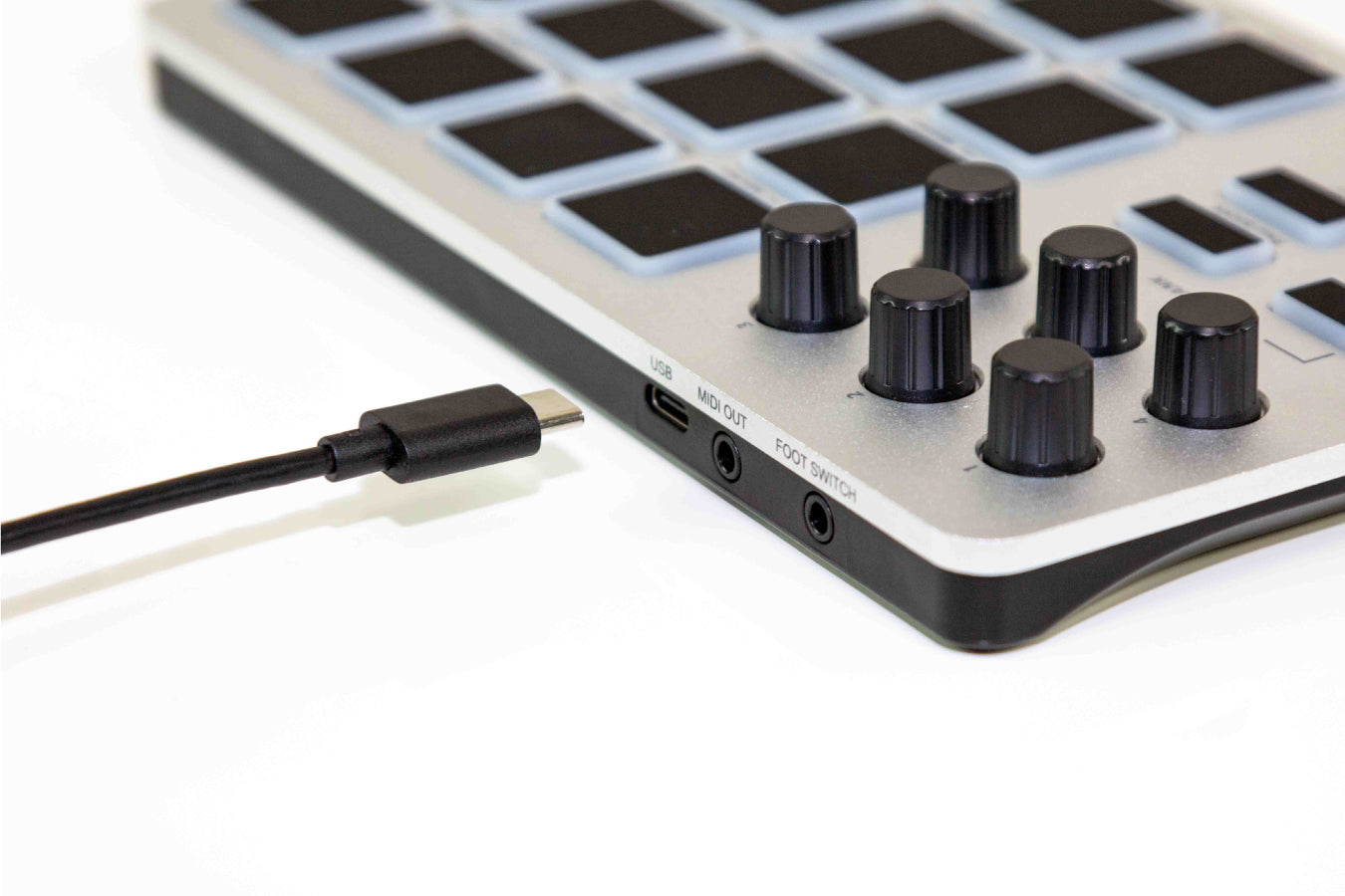Artesia Pro Xjam compact MIDI pad controller angled view
